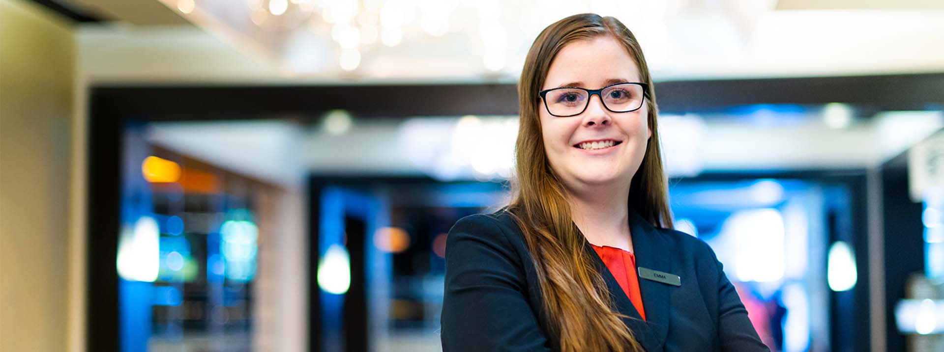 This is a photo of a female tourism and hospitality management student who is on her work term in a hotel.