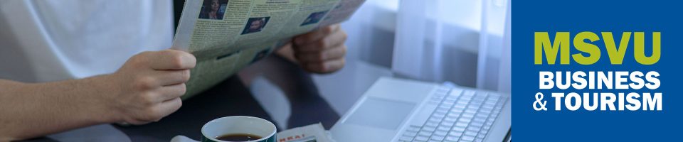 This is a decorative banner. On the left is a photo of a person holding a newspaper sitting at a table with a cup of coffee and a laptop in front of them. On the right is the MSVU business and tourism log.