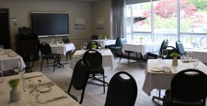 Mount Tourism and Hospitality Management Vincent's restaurant. Tables set for dining with chairs. 