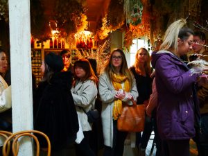 Sustainable business tour. Students in gift shop at Tangled gardens. 2019