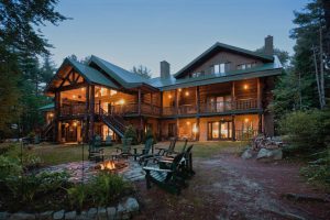 Trout Point Lodge from outside at dusk 