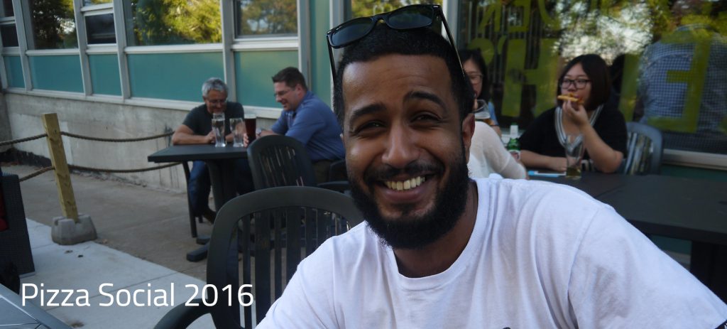 Business and Tourism student enjoying the society pizza social in the garden outside of Vinnies Pub. Date 2016.