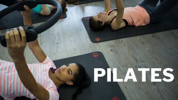 A Pilates class using rings
