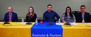 People sitting at table. Accounting Career Week panelists