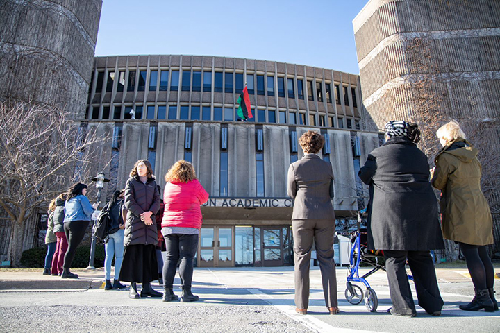 Pan-African flag being raised outside Seton Hall on the MSVU campus