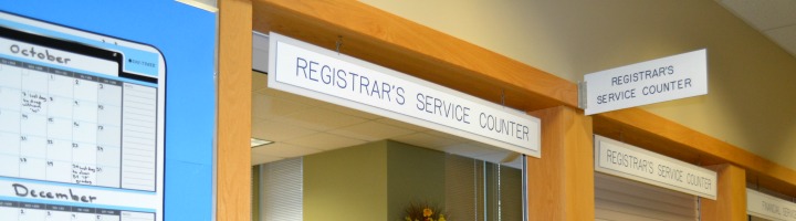 Image of the signage in the registrars/admissions office that direct students where they would like to go