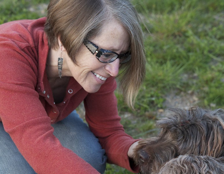 Ardra Cole with her dogs -- header photo