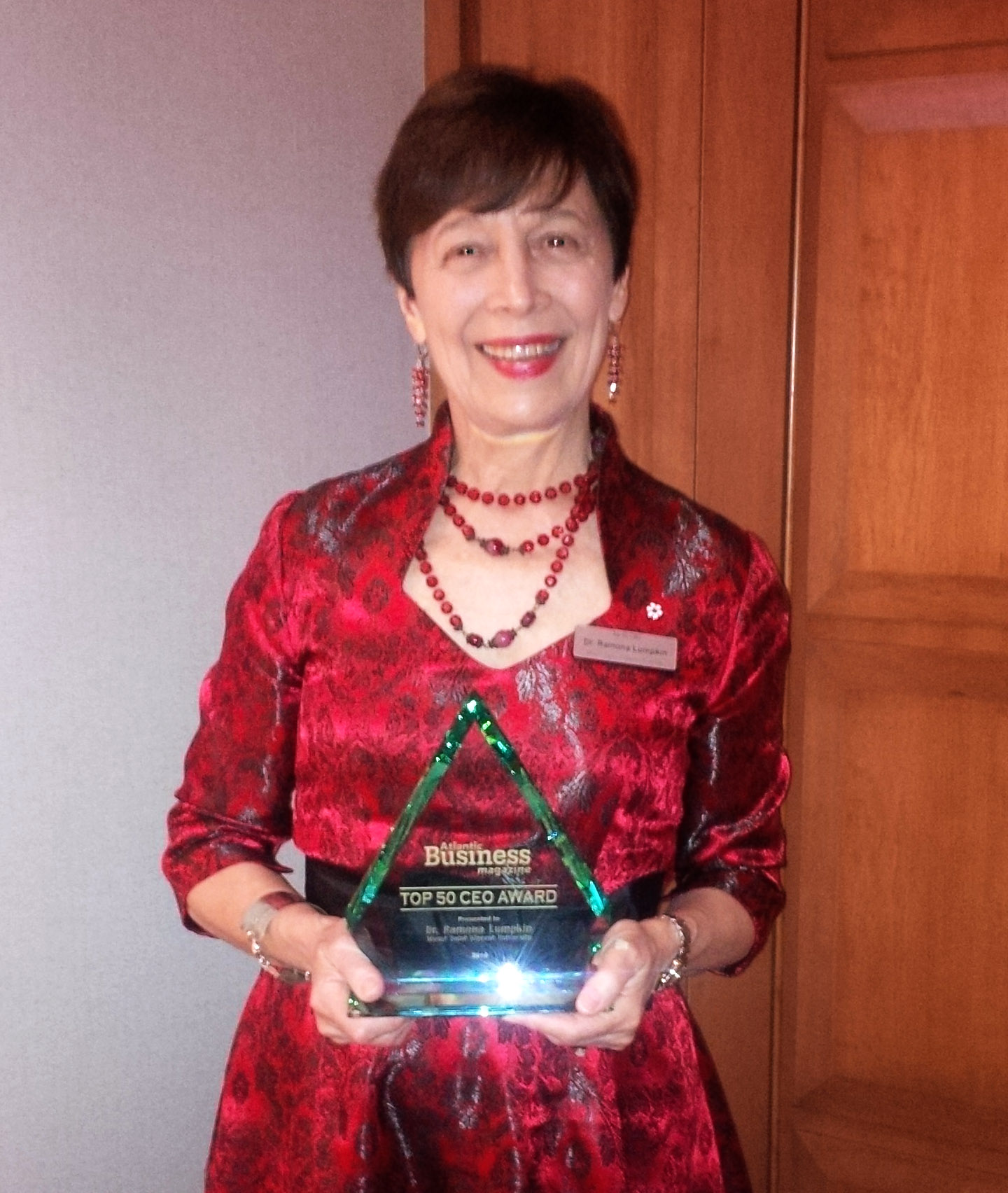 Ramona Lumpkin with 2016 ABM Top 50 CEO Award