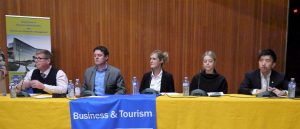 People sitting at a table. Management Career Week Panelists