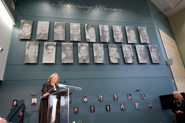 Margaret McCain in front of the inspiring women installation - website