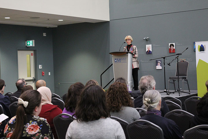 Mary at podium