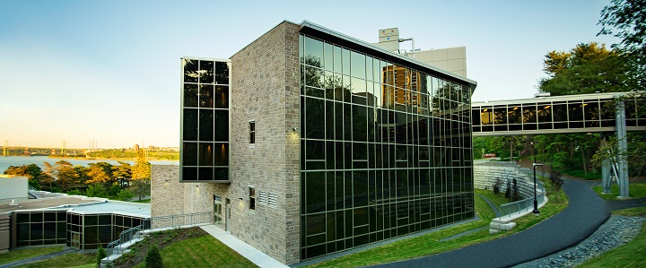 Building named: Margaret Norrie McCain Centre for Teaching, Learning and Research from the back, facing the water