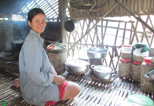 Participant cooking in her kitchen