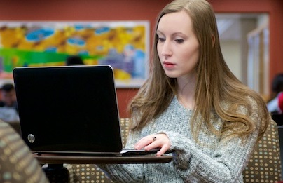 Tech story - Student on laptop in Learning Commons