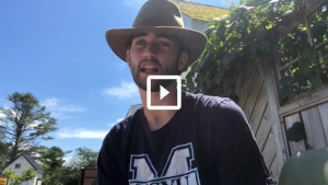 man outside with hat