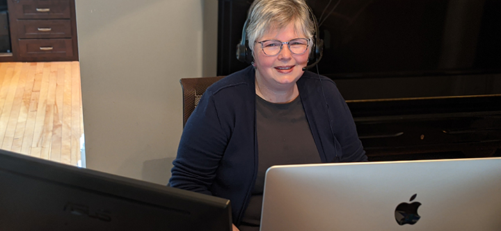 Dr. Kathy Darvesh working on computer