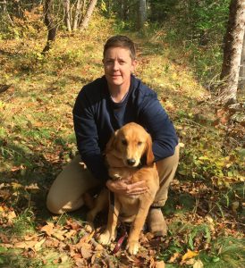 Dr Sarah Reddington with their dog, Sadie