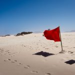 Red Flag on a Beach