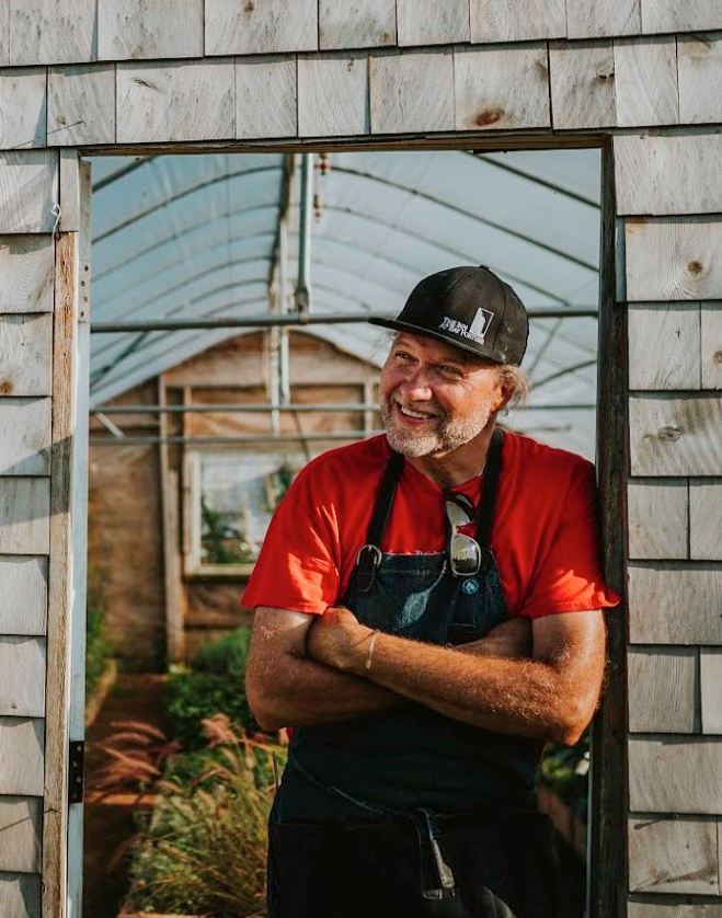 Chef Michael Smith posing for photo in doorway