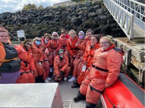 Tourism students on a boat