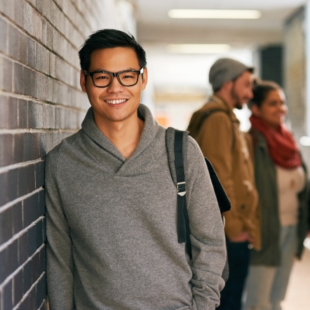 Student smiling at camera