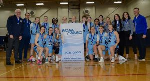 MSVU women's basketball team with ACAA banner