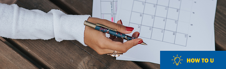 A person filling out information in a calendar with the How to U logo in the bottom right corner