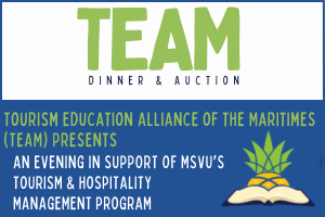 TEAM promo button. TEAM stands for Tourism Education Alliance of the Maritimes. This is the 9th annual dinner and auction fundraising event on November 5th 2024 at 6pm in the Mount's Rosaria Student Centre. This years theme is Celebrating Indigenous Tourism and is called Tourism Destination Mi'kma'ki. The button is on a white and blue background with mostly green writing with a bit of white.