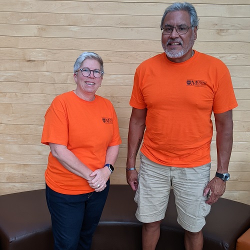 Joël and Patrick wearing their orange shirts for Truth and Reconciliation Day