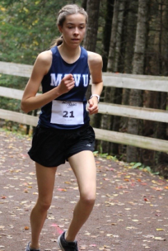 Hannah at a cross-country race