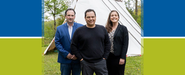 Indigenous community leaders and representatives from MSVU’s Tourism and Hospitality Management Program posing for the Indigenous Tourism Program Banner