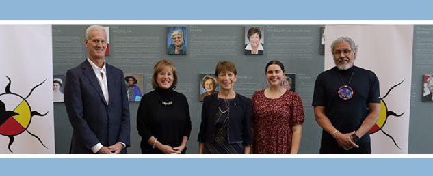 Scott McCain and Leslie McLean, posing alongside former MSVU President Ramona Lumpkin, and members from the MSVU Indigenous Student Centre