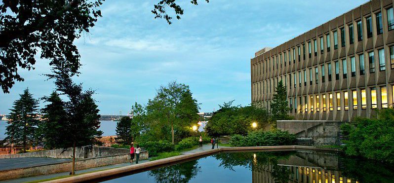 Seton pond and Seton Academic Centre at dusk.