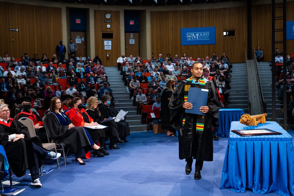 MSVU grad walking across the stage