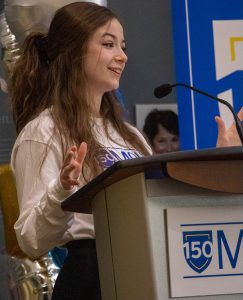 Cheyanne Hardy speaking at a MSVU 150th anniversary event