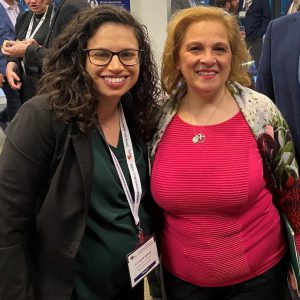 Dr. Jennifer Khoury standing beside a researcher attendee at Science Meets Parliament