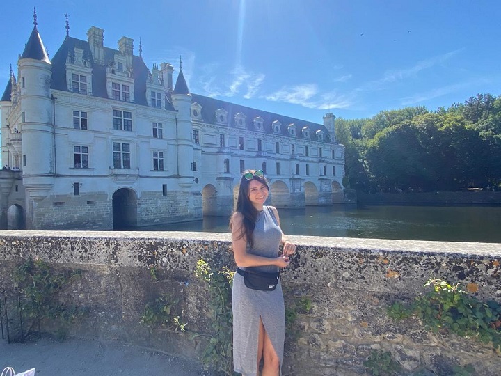 Nya Uriciuoli standing outside of a castle in Angers, France