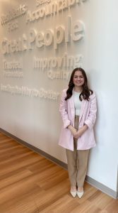 co-op student smiling in the workplace