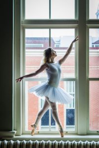 Ballet student in window