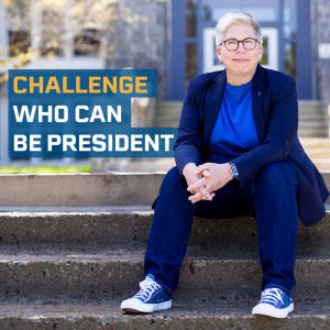 Dr. Joël Dickinson sitting on some steps with the text "Challenge who can be President" beside her