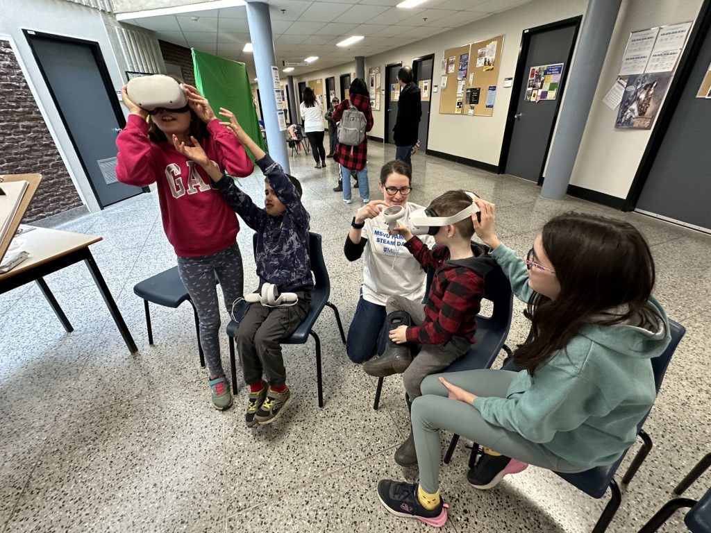 Children viewing moon landing and other space videos using Virtual Reality headsets