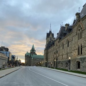 The sunset happening over a historical building in Ottawa