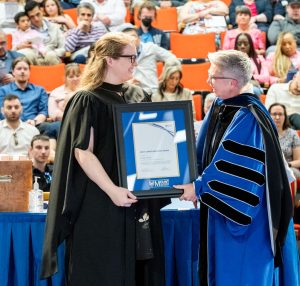 Dr. Svenja Huntemann receiving the Early Career Research Award