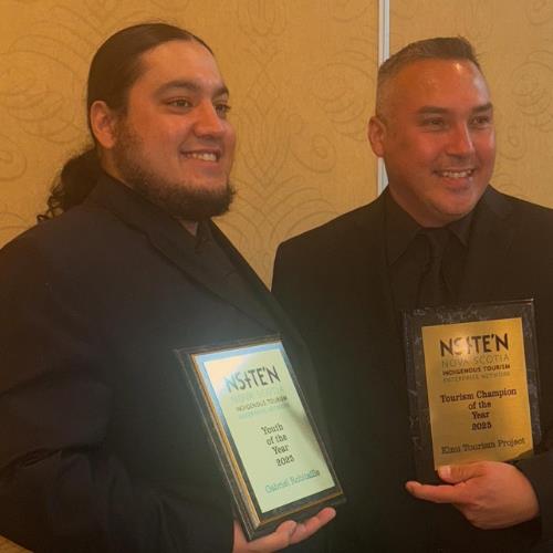 Gabriel Robitaille and Bradley Paul holding their NSITEN awards