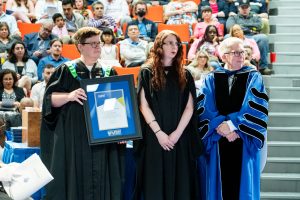 Dr. Karyn McLellan receiving the Alumni Early Career Teaching Award