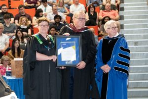 Roy Jamieson receiving the Alumni Part-Time Faculty Teaching Award.
