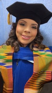 Rajean Willis wearing convocation attire