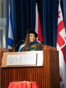 Rajean Willis giving her Valedictorian speech at the Friday morning 2025 Convocation Ceremony