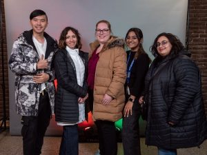 Simranpreet Kaur and other students posing in a group photo