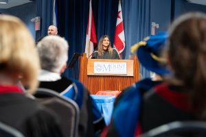 Simranpreet Kaur, giving the valedictorian speech at the Thursday afternoon convocation ceremony